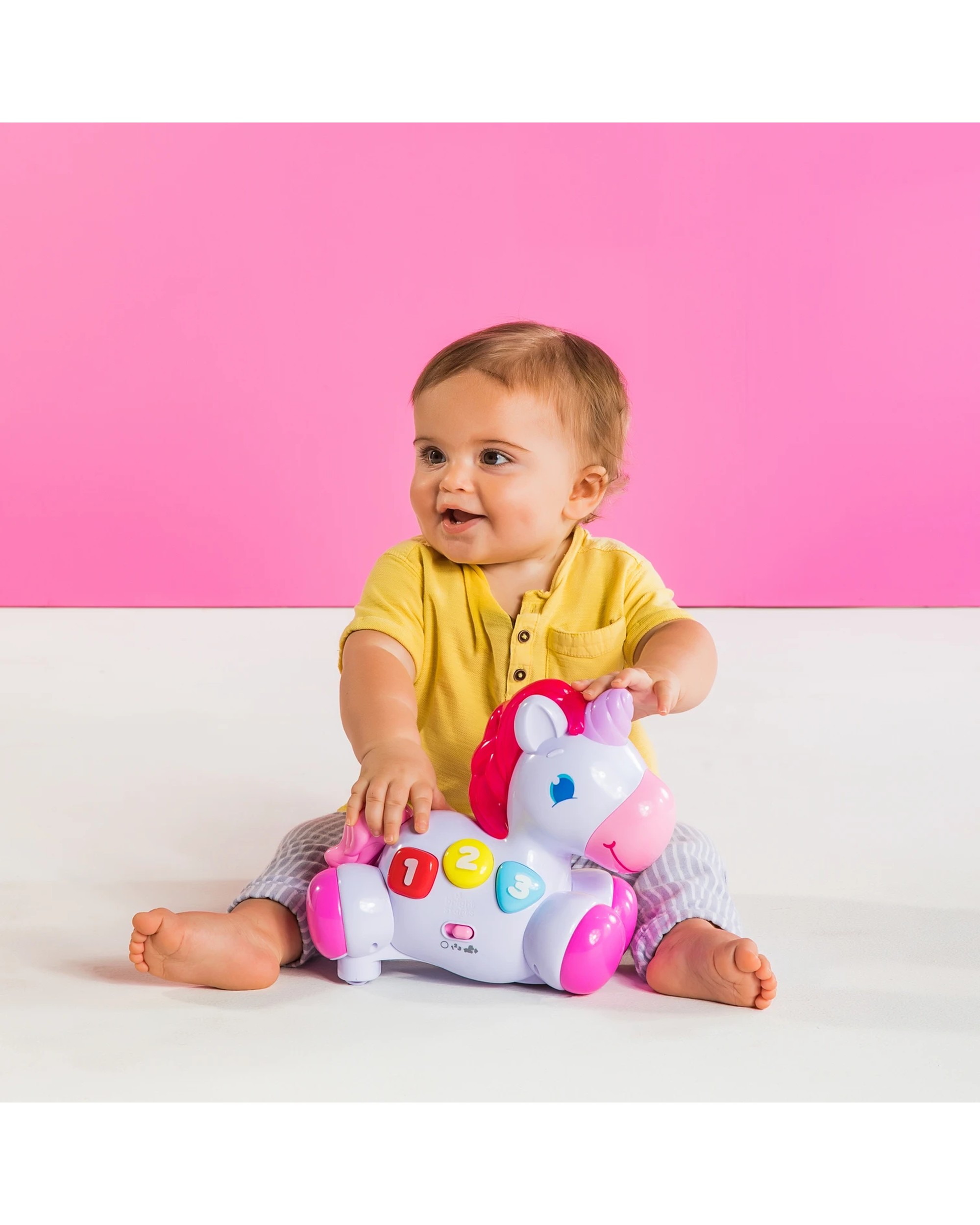 Bright starts rock and glow deals unicorn toy